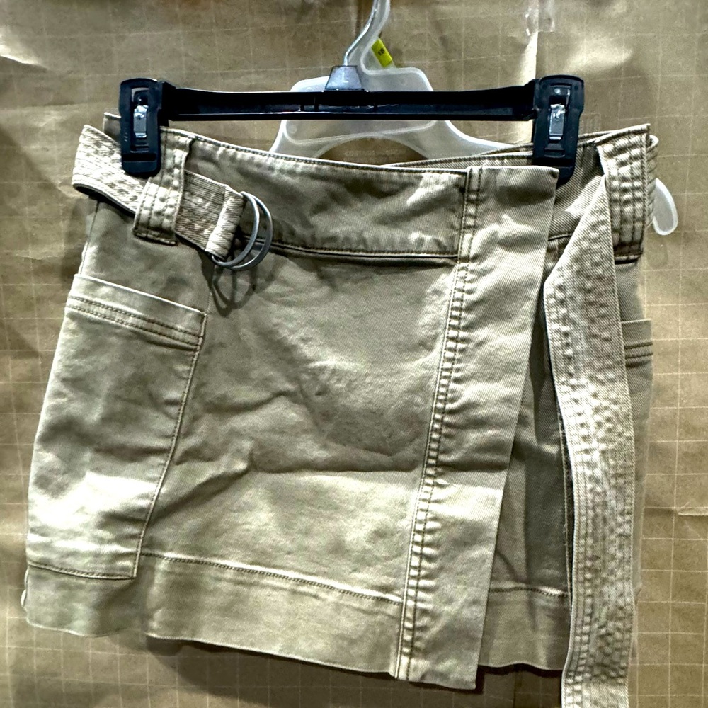 Denim wrap around skirt,dress up or casual has two side pockets,adjustable belt.